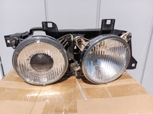 Load image into Gallery viewer, 88-95 BMW E34 OEM Hella headlight, RIGHT 131740-00RE