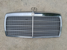 Load image into Gallery viewer, 85-93 Mercedes Benz W124 OEM grille mint 1248880223