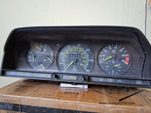 Load image into Gallery viewer, 83-93 Mercedes Benz W201 190E 6 cyl. instrument cluster 88k miles gauges tested OK
