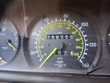 Load image into Gallery viewer, 83-93 Mercedes Benz W201 190E 6 cyl. instrument cluster 88k miles gauges tested OK
