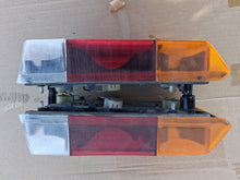 Load image into Gallery viewer, Volkswagen Golf MK1 Rabbit Cabriolet OEM Tail lights, pair
