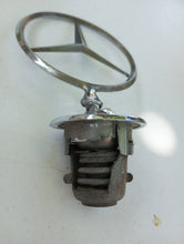 Load image into Gallery viewer, 77-85 Mercedes Benz W123 hood grille ornament, OEM #1238800086
