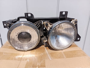 88-95 BMW E34 OEM Hella headlight, RIGHT 131740-00RE