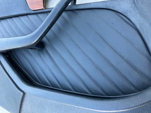 79-91 Mercedes Benz W126 driver door panel w/handle black