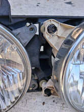 Load image into Gallery viewer, 88-95 BMW E34 OEM Hella headlight, LEFT 131740-00RE
