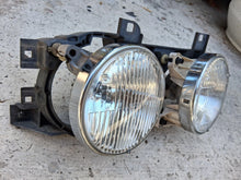 Load image into Gallery viewer, 88-95 BMW E34 OEM Hella headlight, LEFT 131740-00RE
