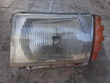 Load image into Gallery viewer, 72-89 Mercedes Benz R107 Euro Headlight Left OEM 1305541065
