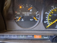 Load image into Gallery viewer, 83-93 Mercedes Benz W201 190E 6 cyl. instrument cluster 155k miles gauges tested OK
