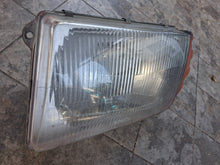 Load image into Gallery viewer, 72-89 Mercedes Benz R107 Euro Headlight Left OEM 1305541065
