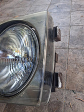 Load image into Gallery viewer, 76-86 Mercedes Benz W123 left side headlight BOSCH 1305543067
