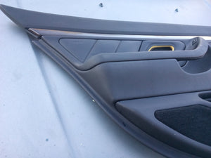96-03 BMW E38 left rear door card, black