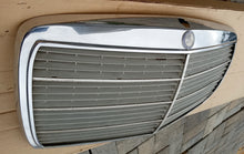 Load image into Gallery viewer, 77-85 Mercedes W123 front grille OEM 1238800923
