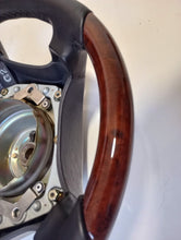 Load image into Gallery viewer, Mercedes Benz W140/129/124 steering wheel refurbished in new leather/wood
