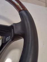 Load image into Gallery viewer, Mercedes Benz W140/129/124 steering wheel refurbished in new leather/wood
