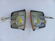 Load image into Gallery viewer, 83-93 Mercedes Benz W201 pair of OEM turn signals

